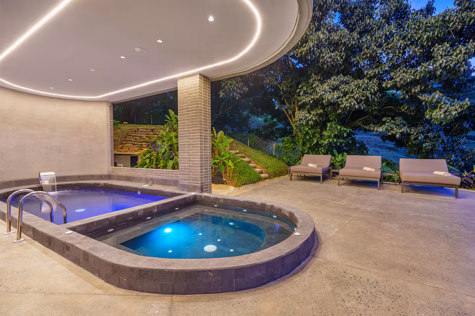 Pool and spa area beneath the villa terrace